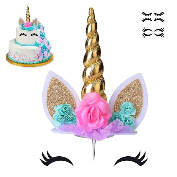 Unicorn horn and ears cake topper set with gold spiral horn, glitter ears, pink and teal flower cluster, and eyelash cutouts