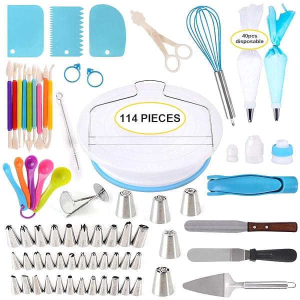 Full 114-piece cake decorating kit flat lay showing rotating turntable, rows of numbered piping tips, pastry bags, icing scrapers, and spatulas