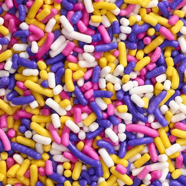 Large jar of rainbow sprinkles and edible glitter