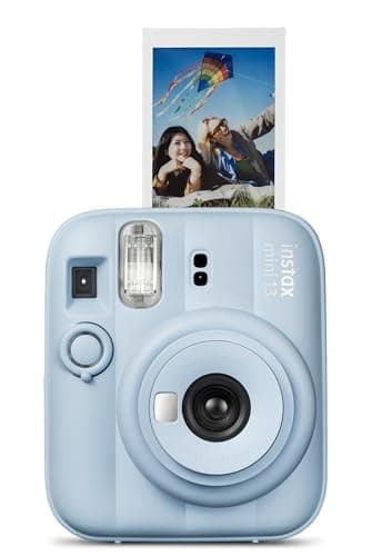 FUJIFILM Instax Mini 13 instant film camera in frost blue with developed instant photo print displayed in front