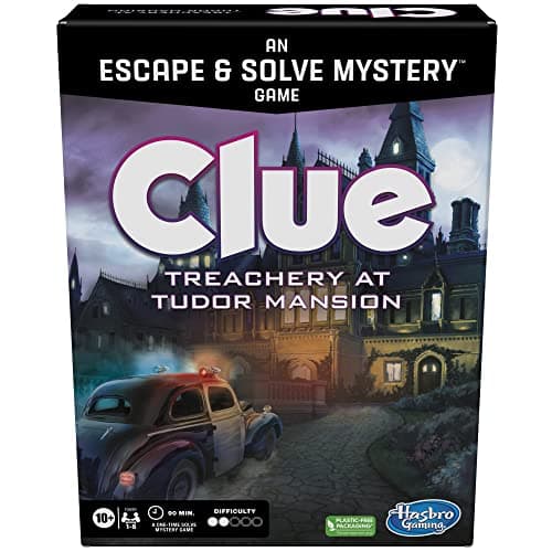 Clue Treachery at Tudor Mansion board game box showing Tudor mansion illustration, with game components including room tiles, suspect tokens, and clue envelopes spread beside it