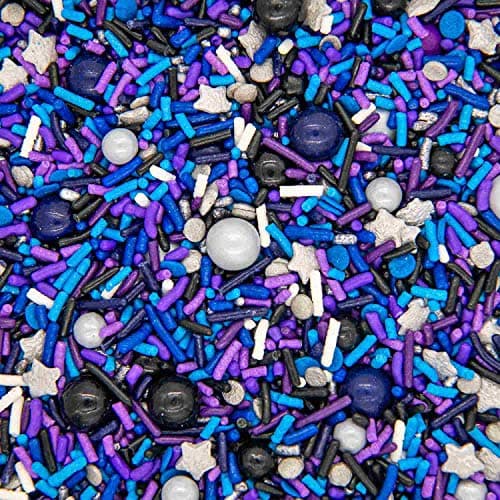 Galaxy sprinkle mix with silver stars, moons, and space-shaped sugar cake decorations