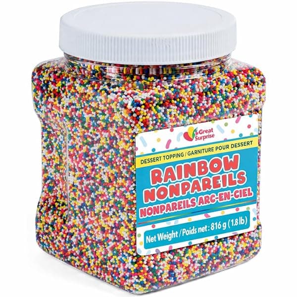 Large jar of colorful rainbow nonpareil sprinkles